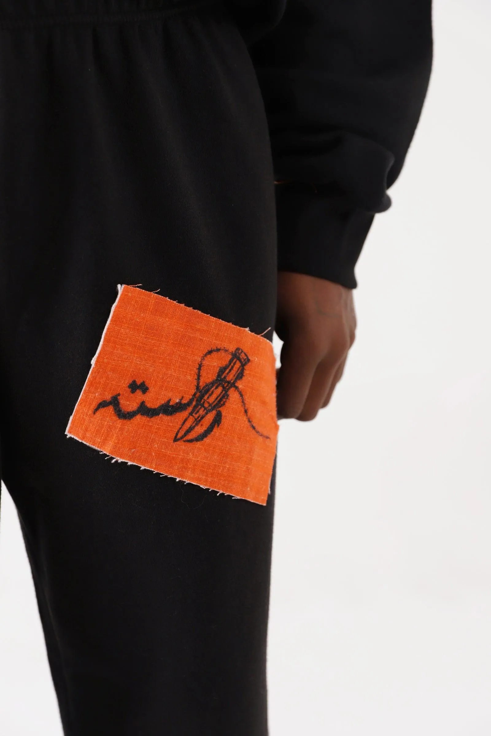 "BREATH OF FIRE" HANDPRINTED SWEATPANTS